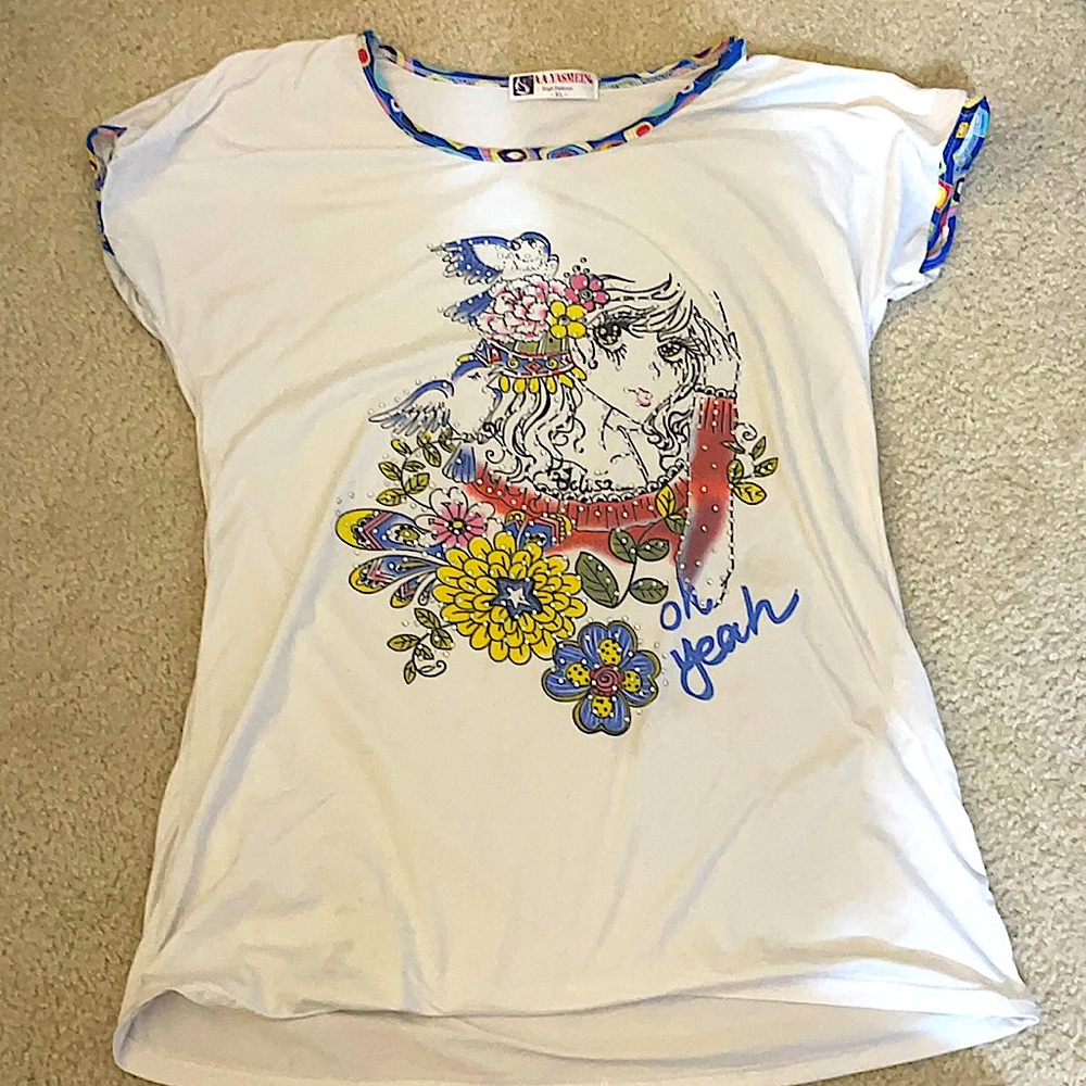 T-shirt of girl with bird and flowers
